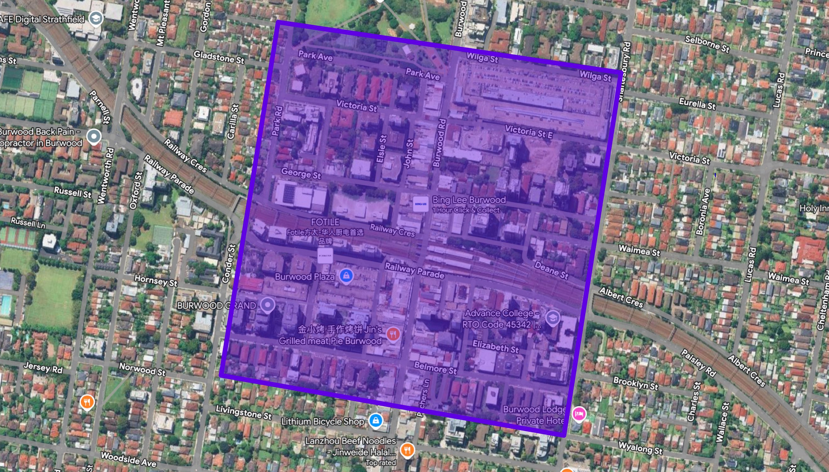 Aerial view of Burwood, Sydney, where shops and housing sit together in the same streets